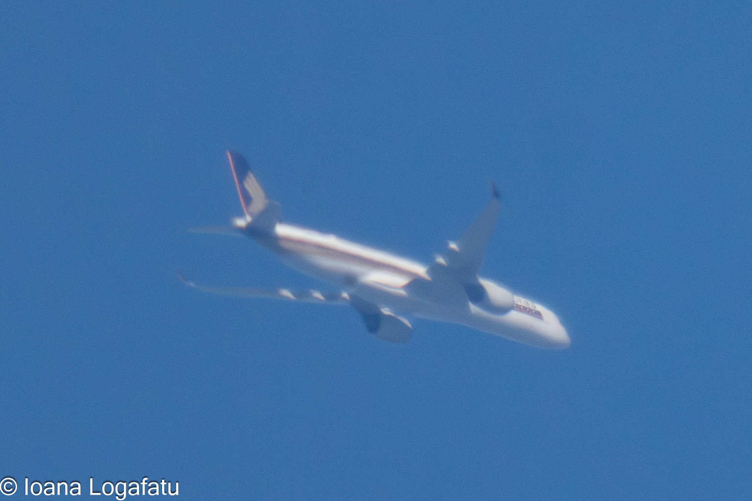 Jet soaring in the clear blue sky